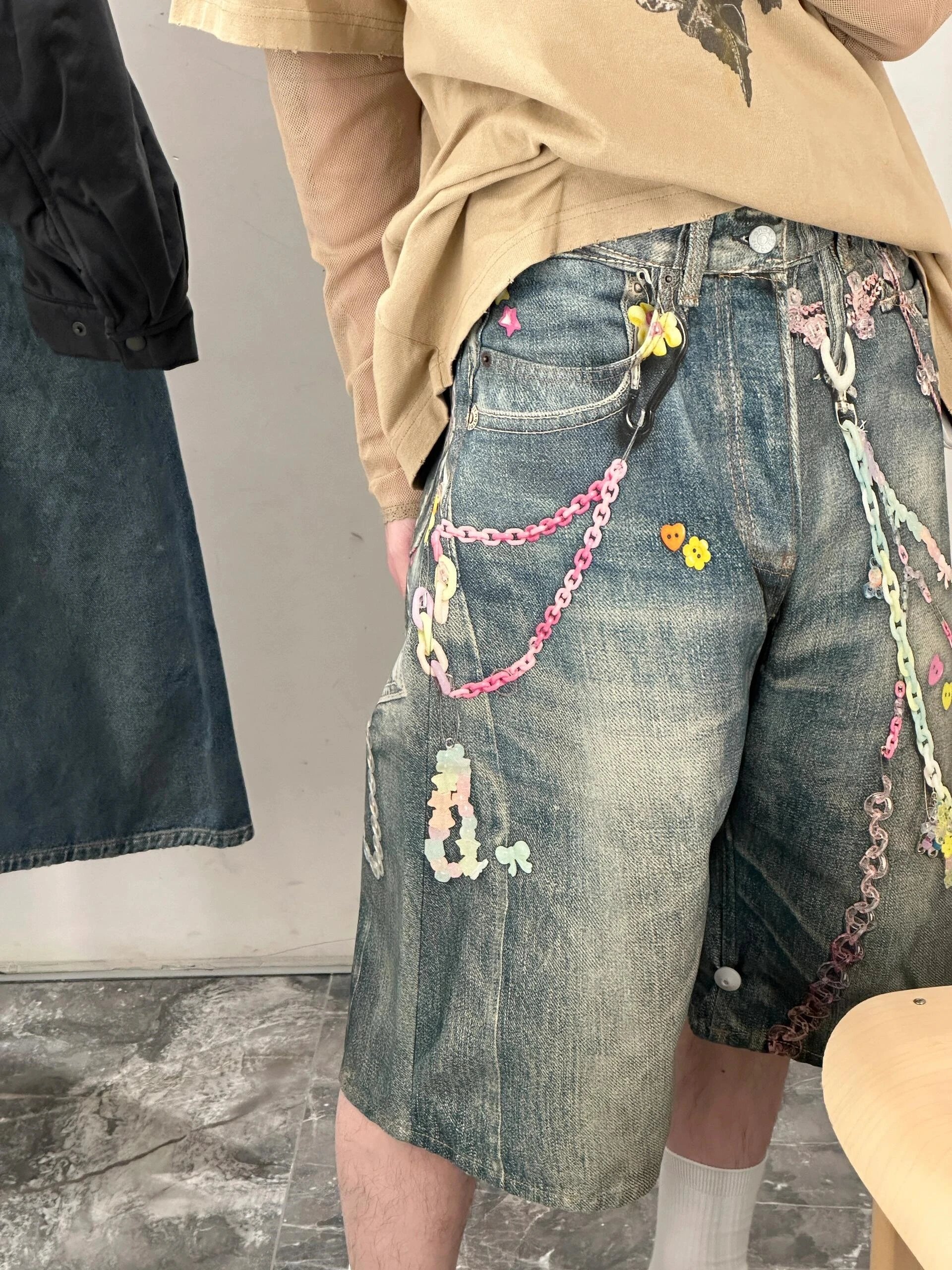 Customized Denim Shorts with Chains and Embellishments