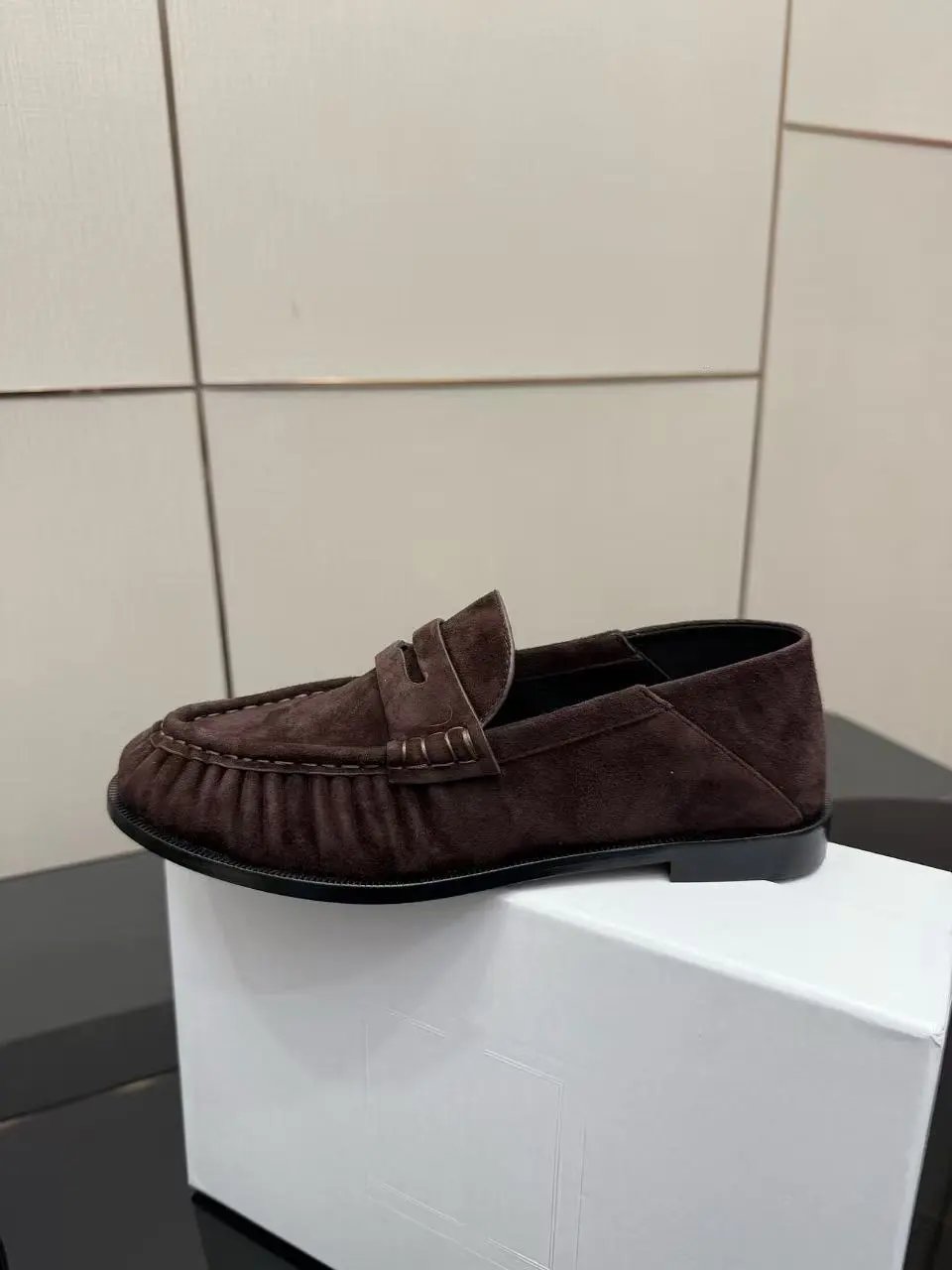 Wine red lamb stomping on its feet