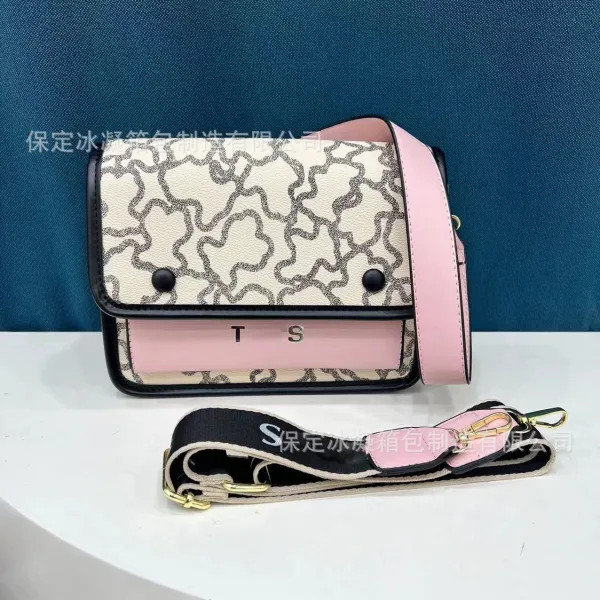 Design Crossbody Bag with Abstract Print and Pink Accents - 1