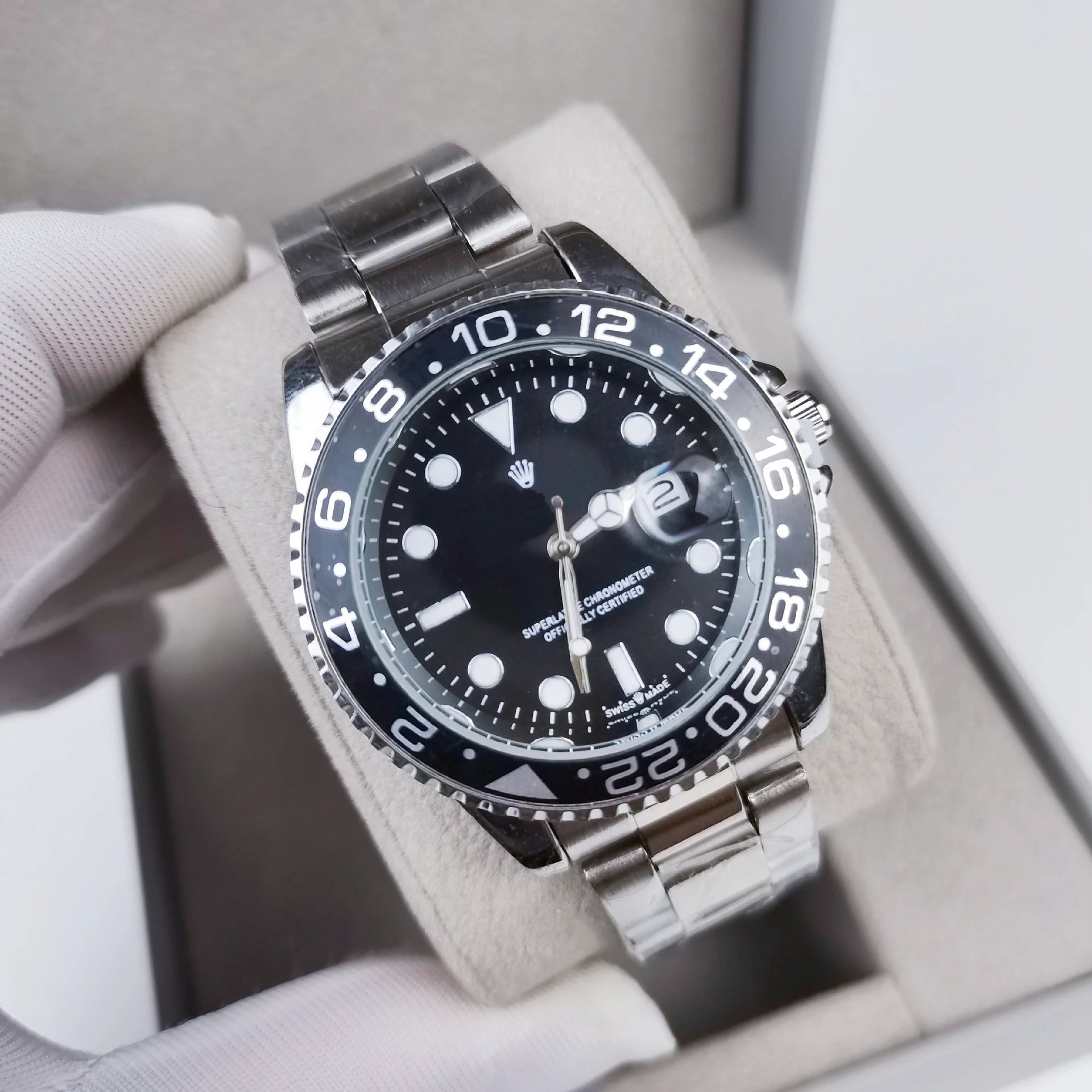 Rolex Submariner and GMT-Master — Three black-shell, black-face Coke rings