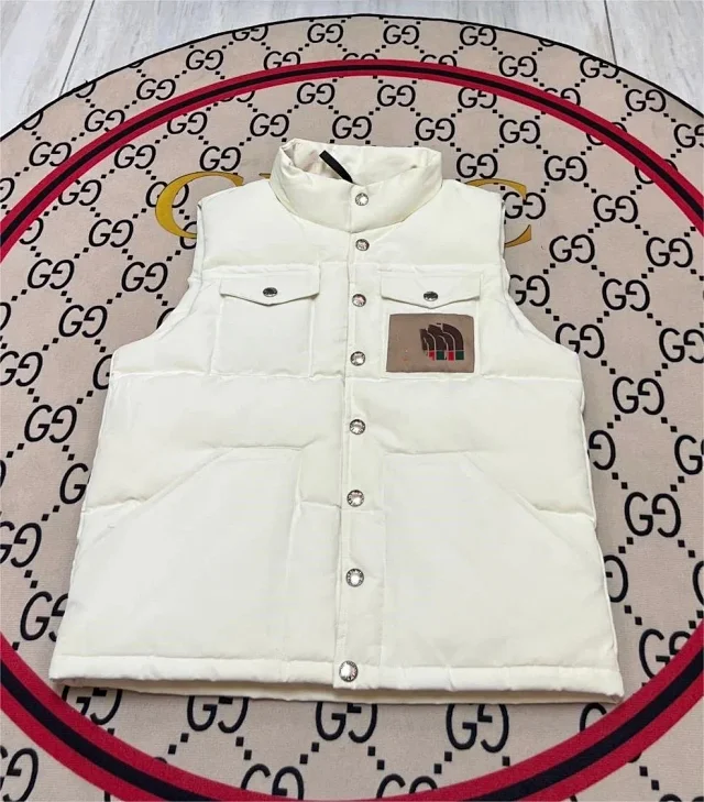 The North Face Vests 700-fill hooded color-block puffer vest product detail image 6
