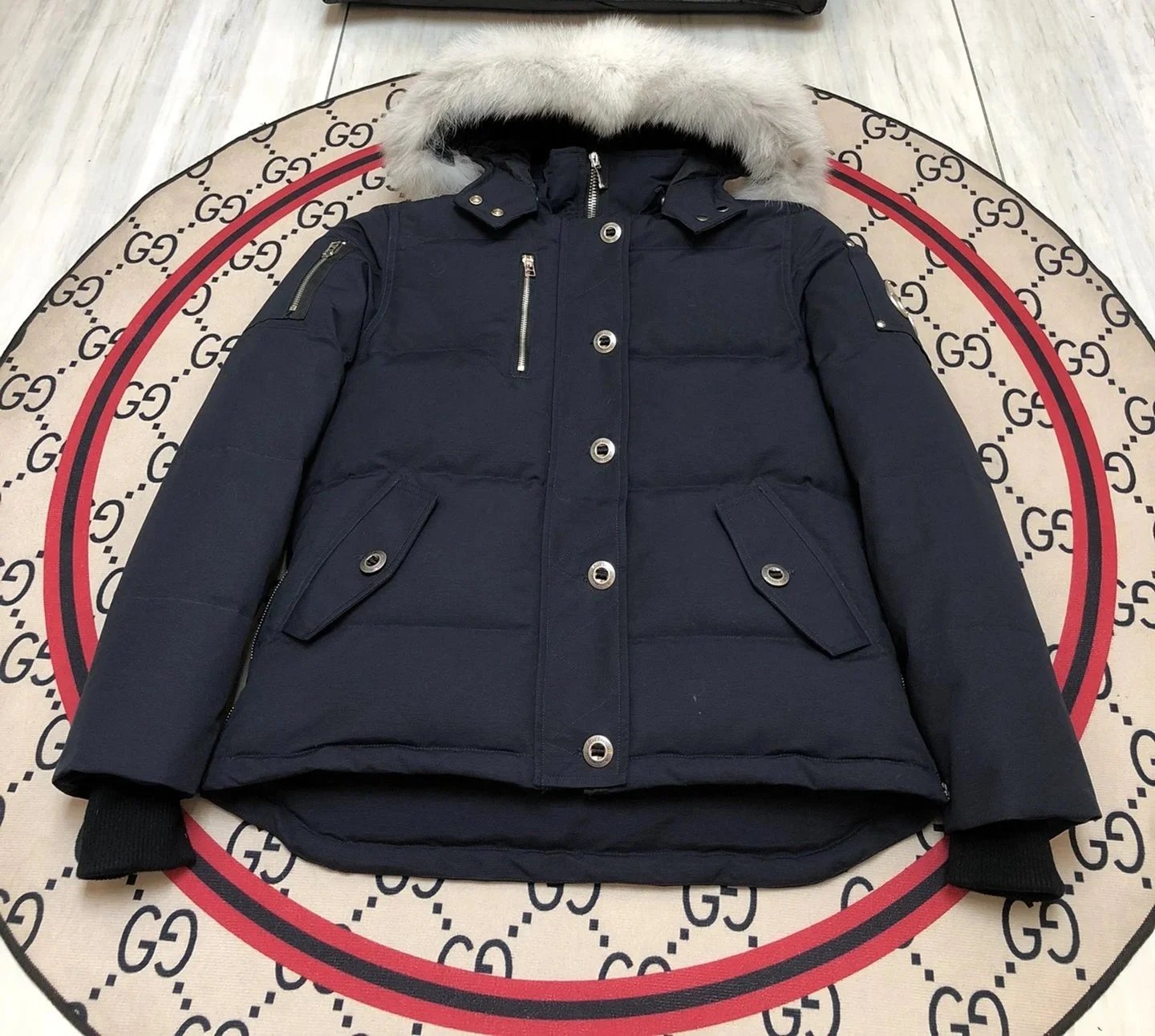 Moose Knuckles Down Jackets Fur-trim hood long parka with pom-pom details — 17