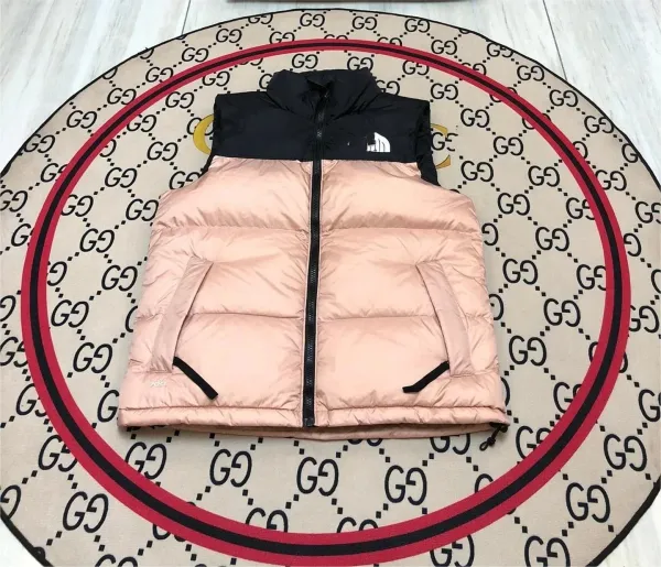 The North Face 1996 Retro Nuptse Vest Pink / Black Outerwear.vest - 1