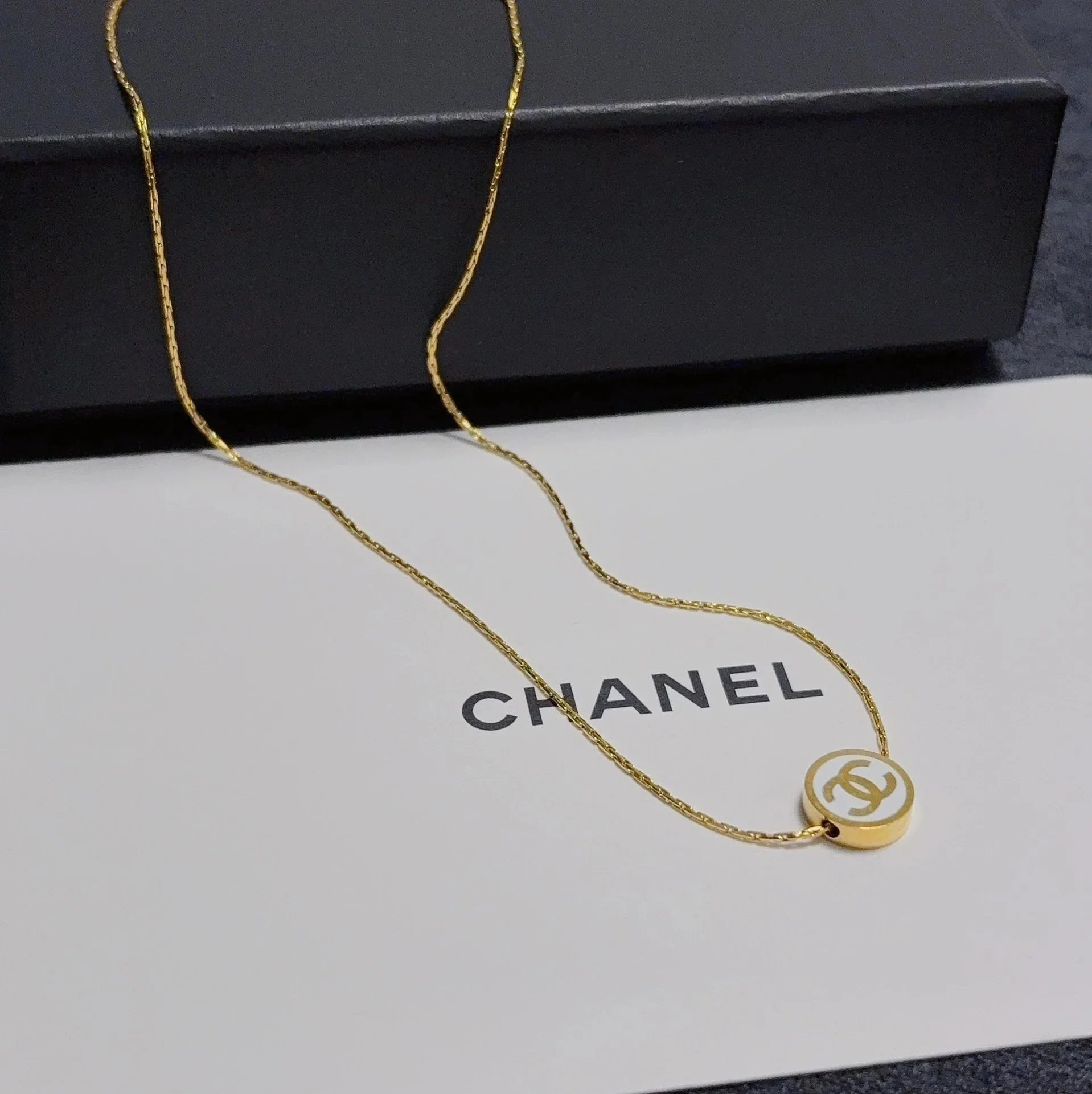 Chanel double C logo pendant necklace.