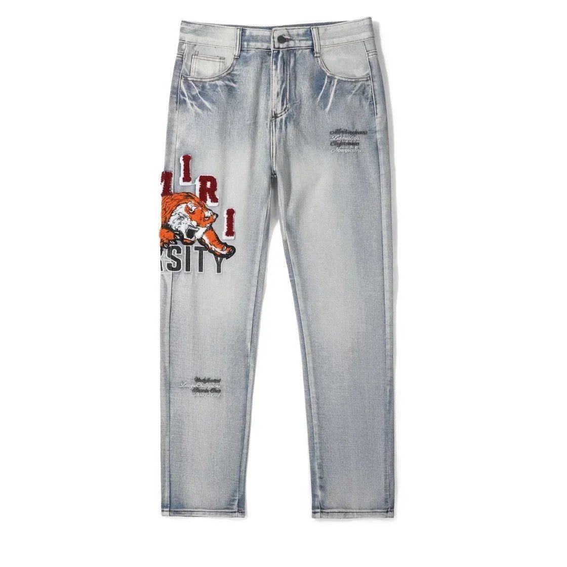 AMIRI tiger embroidered jeans.