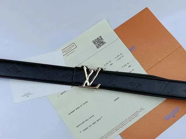 Louis Vuitton Belts Black textured belt with LV initial buckle product detail image 6