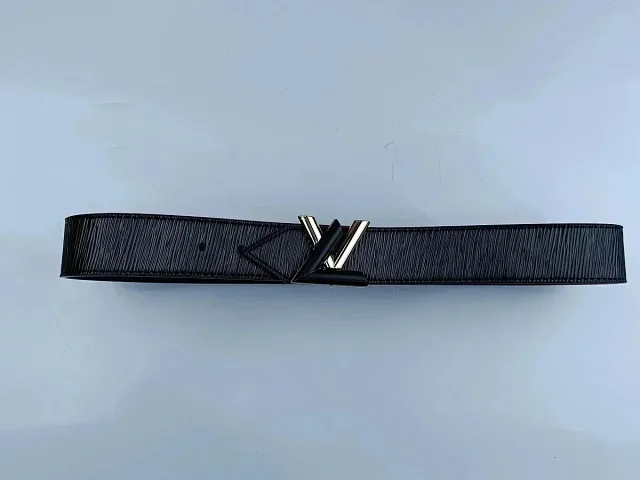 Louis Vuitton Belts Black textured belt with LV initial buckle product detail image 9