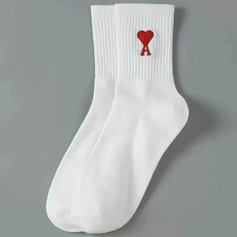 AMI Paris Socks Ribbed crew with de Cœur embroidery — A01