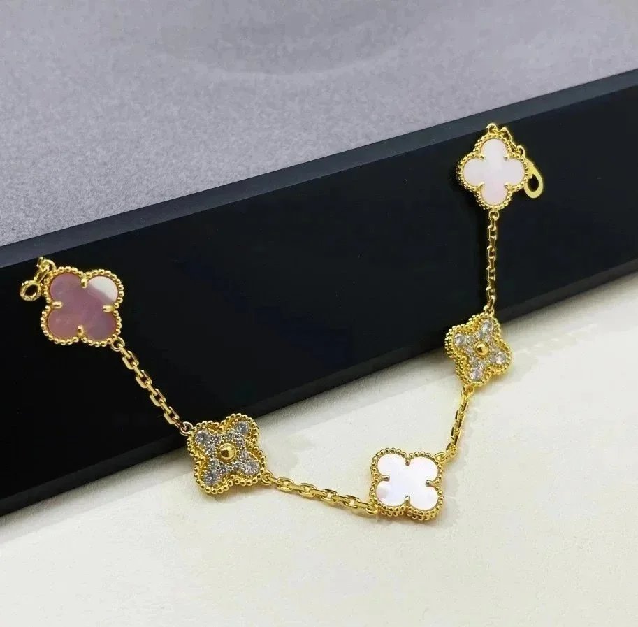 Van Cleef & Arpels Van Cleef & Arpels Alhambra Bracelet in Gold with Pink and White Clover Motifs Gold