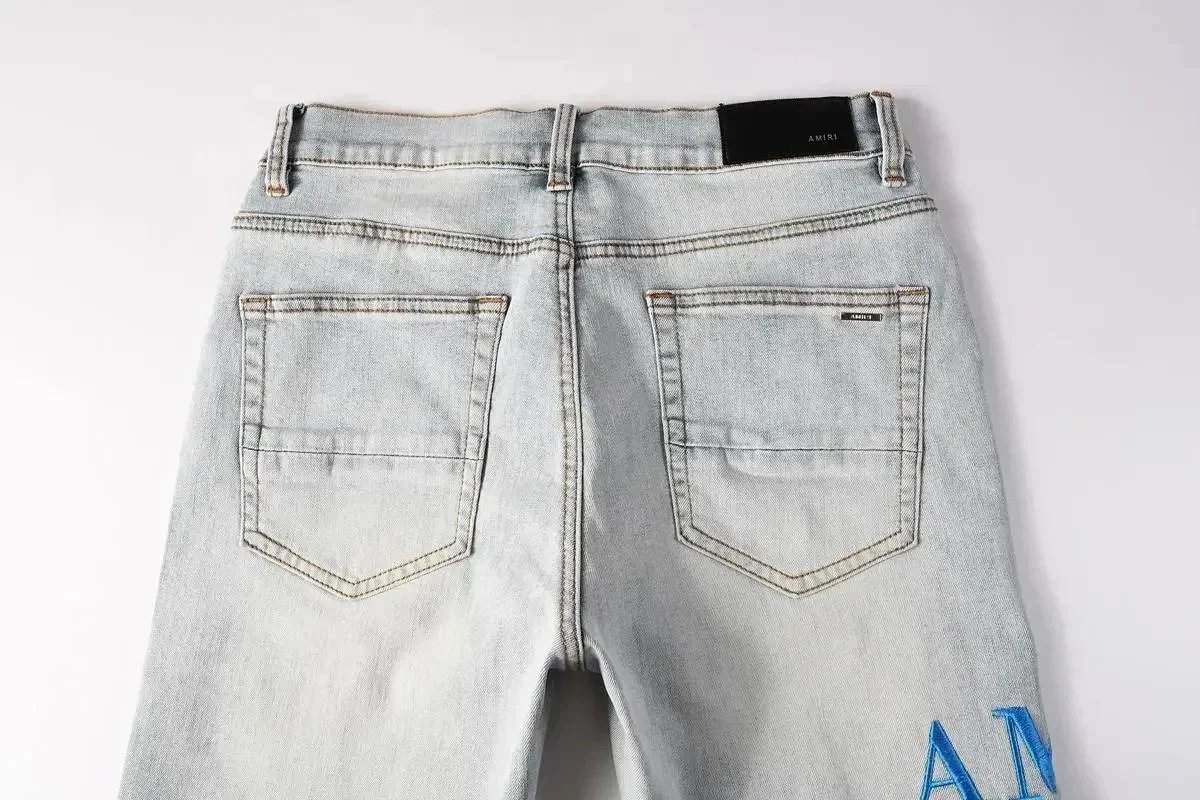 Amiri Distressed White Denim Shorts