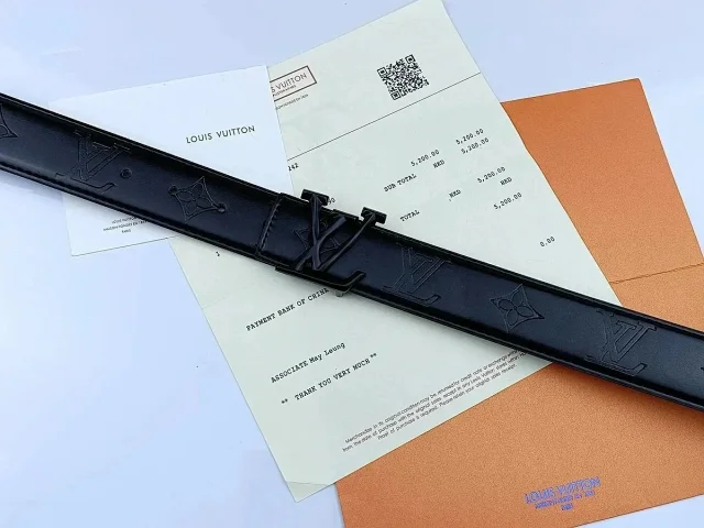 Louis Vuitton Belts Black textured belt with LV initial buckle product detail image 5