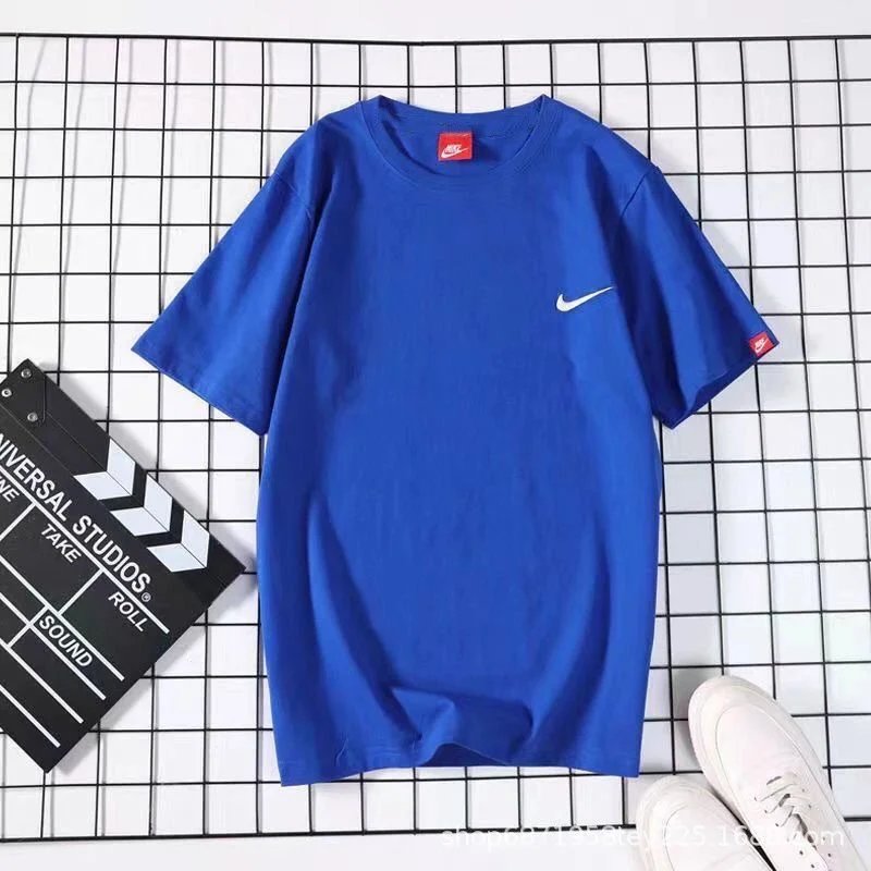 Blue small checkmark on the left chest