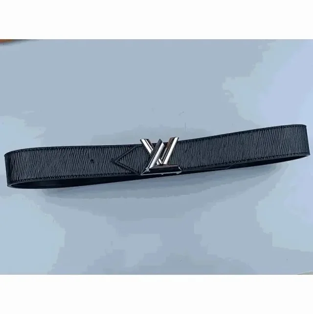 Louis Vuitton Belts Black textured belt with LV initial buckle product detail image 1
