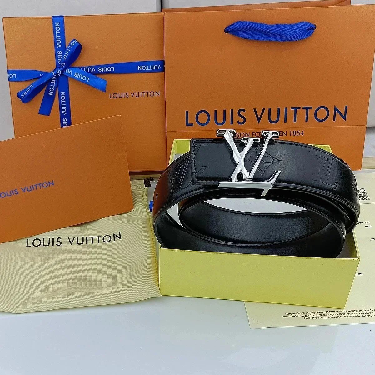 Louis Vuitton Belts Black textured belt with LV initial buckle image 14