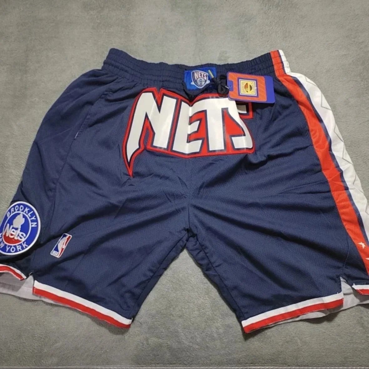 Mitchell & Ness Brooklyn Nets Basketball Shorts - Navy Blue with Red and White Accents Navy
