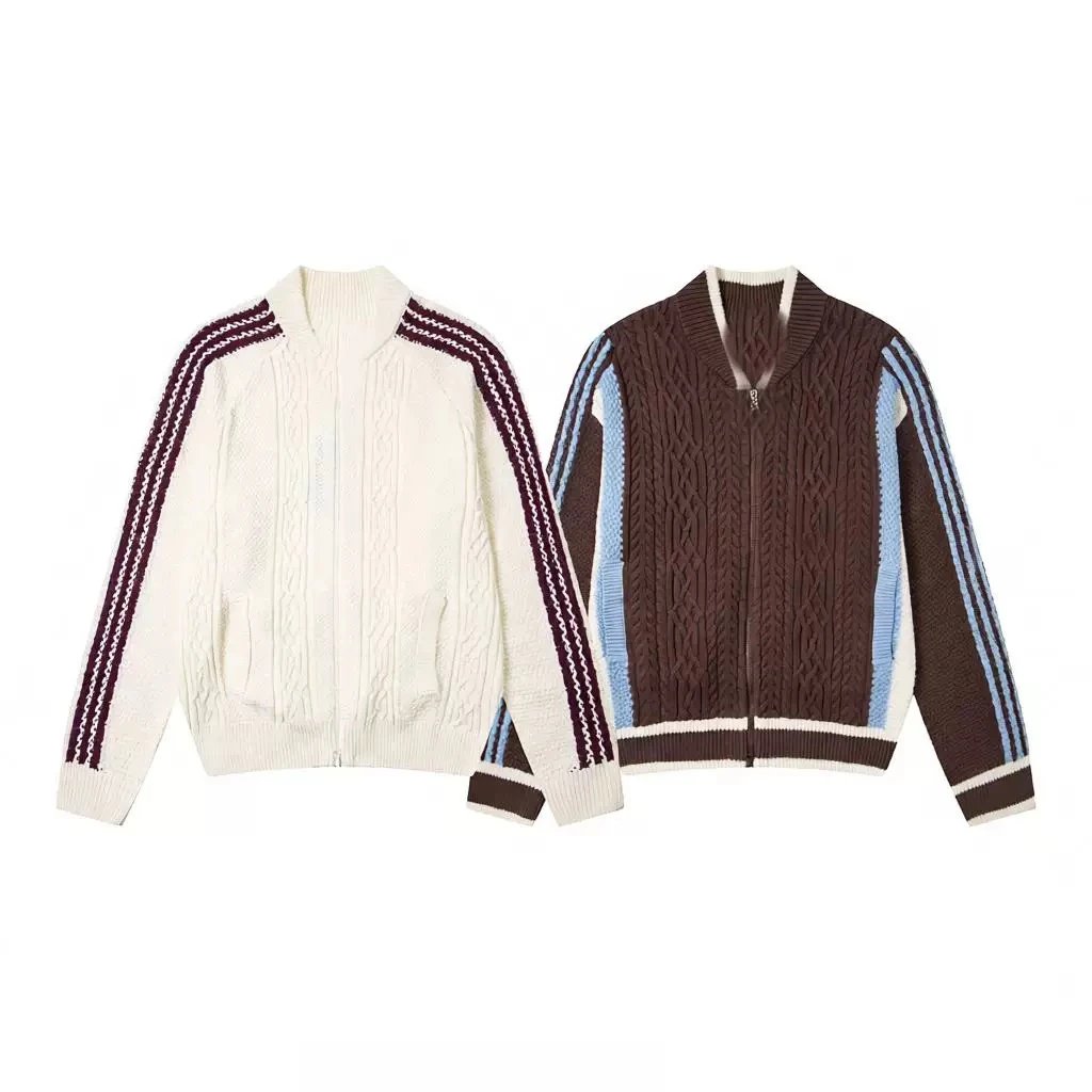 Cable knit zip-front sweater jacket with striped sleeve panels and ribbed collar cuffs hem