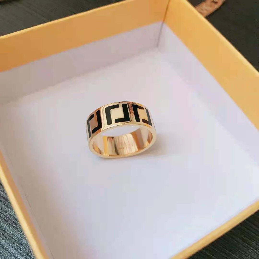 Fendi Gold Black Logo Wide Band Ring Unisex