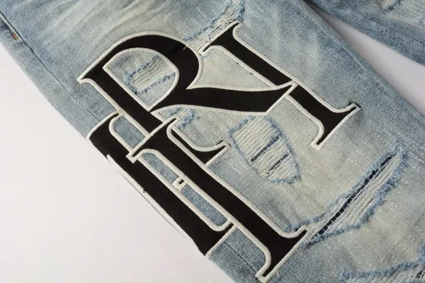 Amiri Distressed Logo Print Light Wash Skinny Jeans - 6