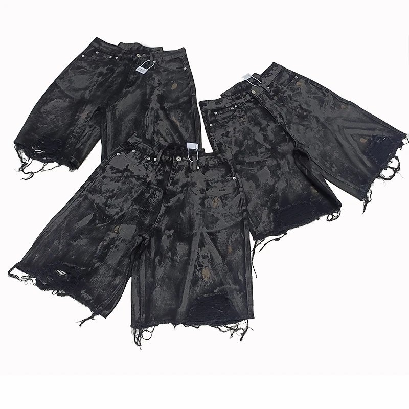 Distressed Black Denim Shorts with Raw Hem and Bleach Wash