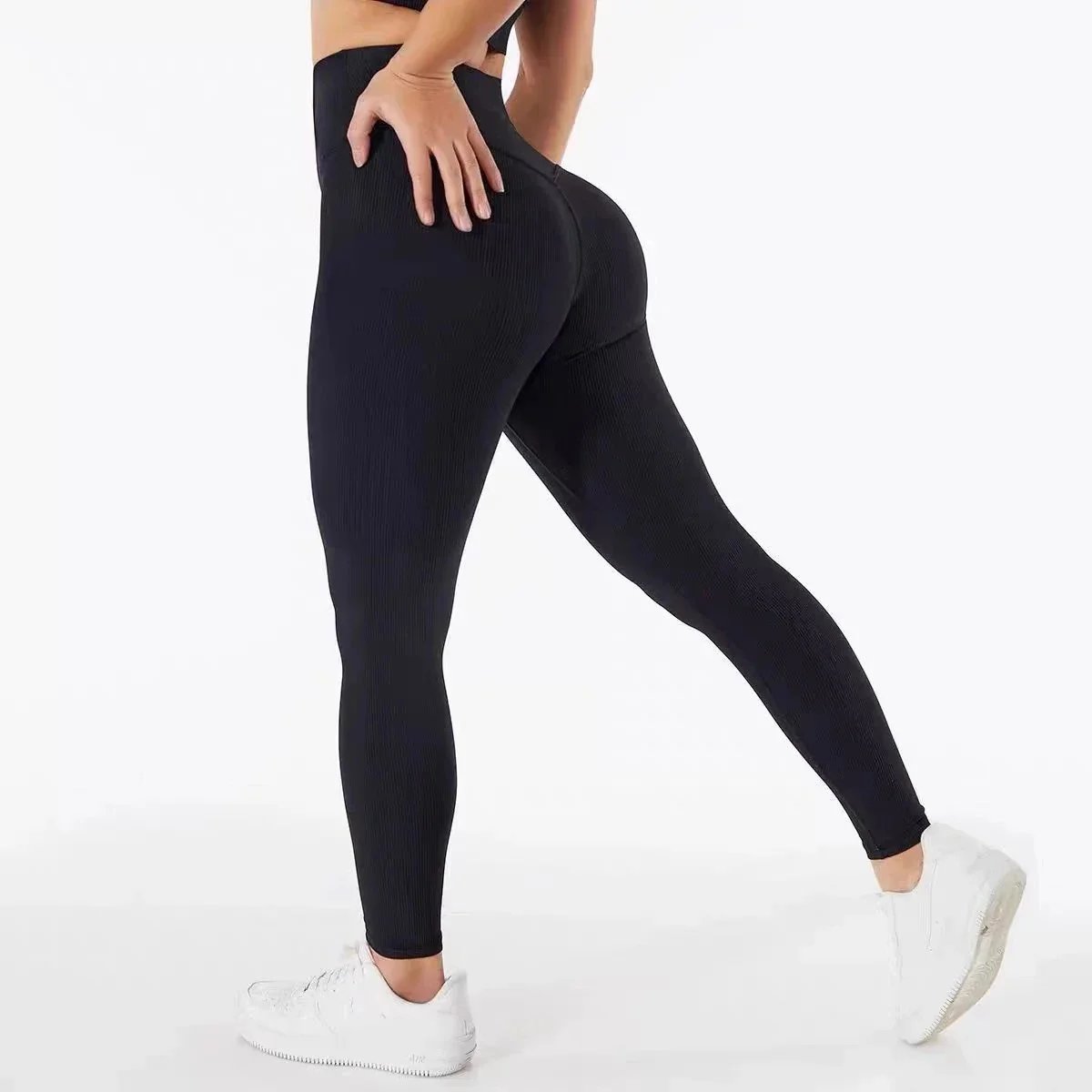 Alo Matching Sets Ribbed long-sleeve crop top and high-waisted shorts set — Black ribbed trousers