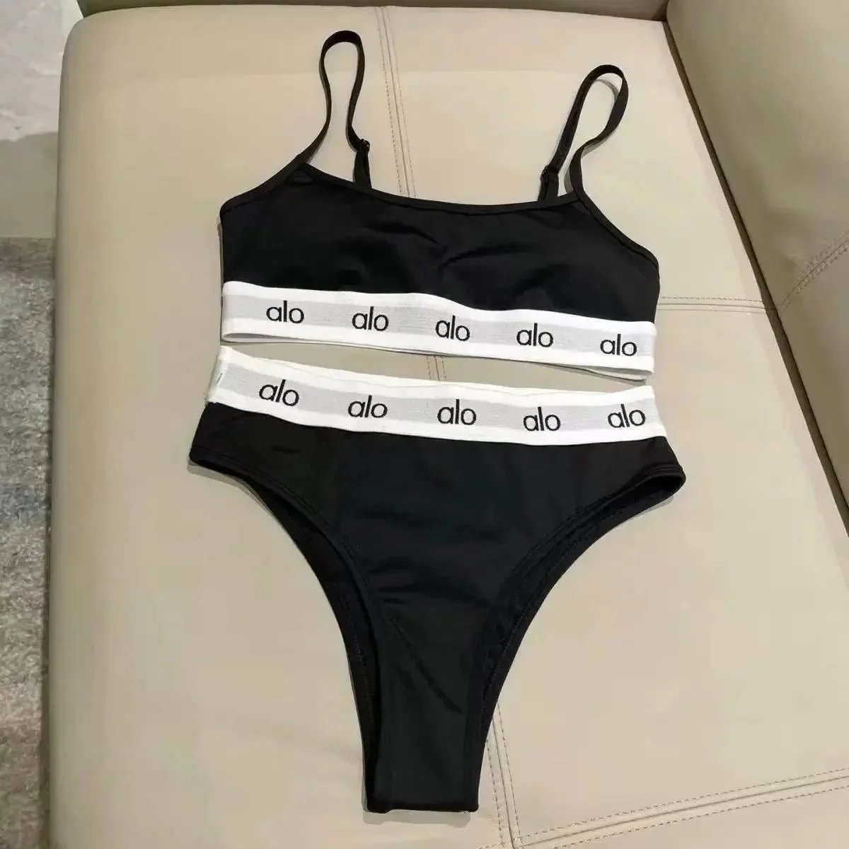 Alo Matching Sets Ribbed long-sleeve crop top and high-waisted shorts set — Bikini-Black