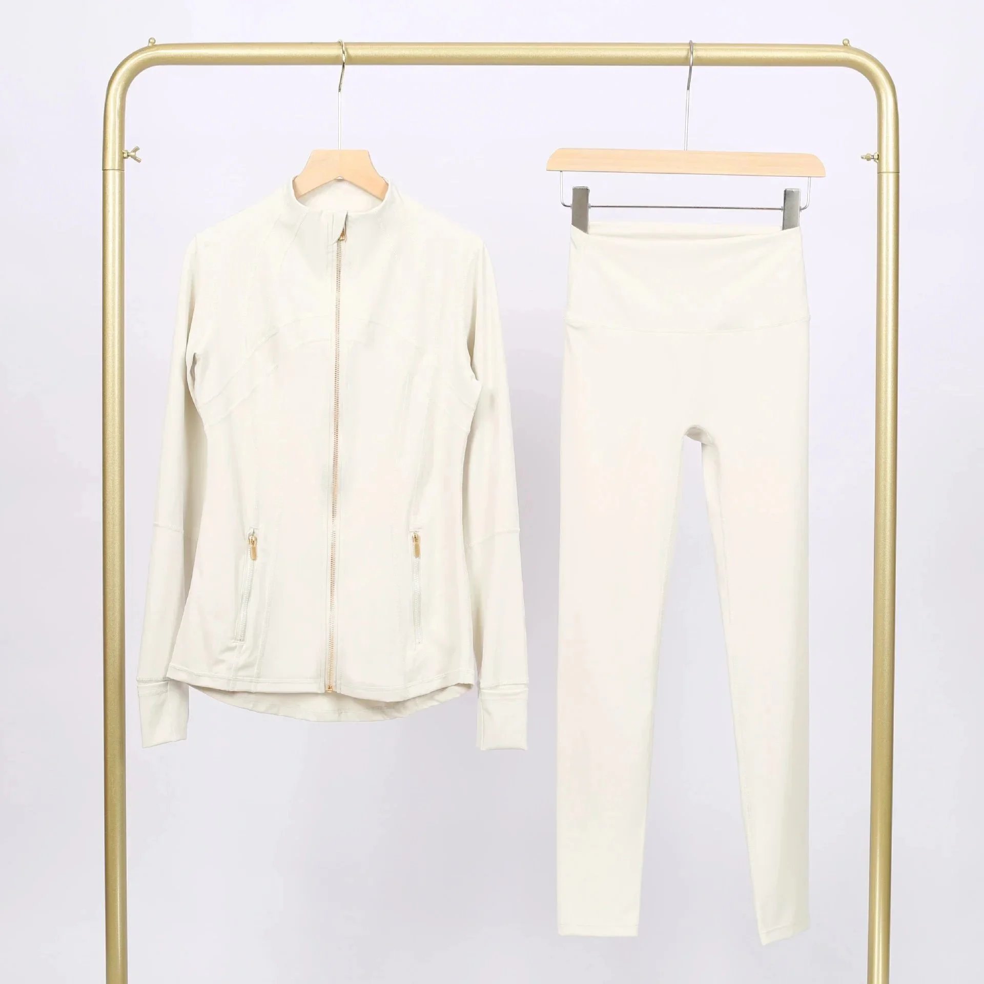 Alo Matching Sets Contrast-trim camisole top and wrap skirt set — Albumin gold-zip jacket and cropped pants set