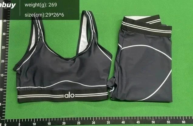 Alo Matching Sets Ribbed long-sleeve crop top and high-waisted shorts set — Black [Set: Top and Pants]