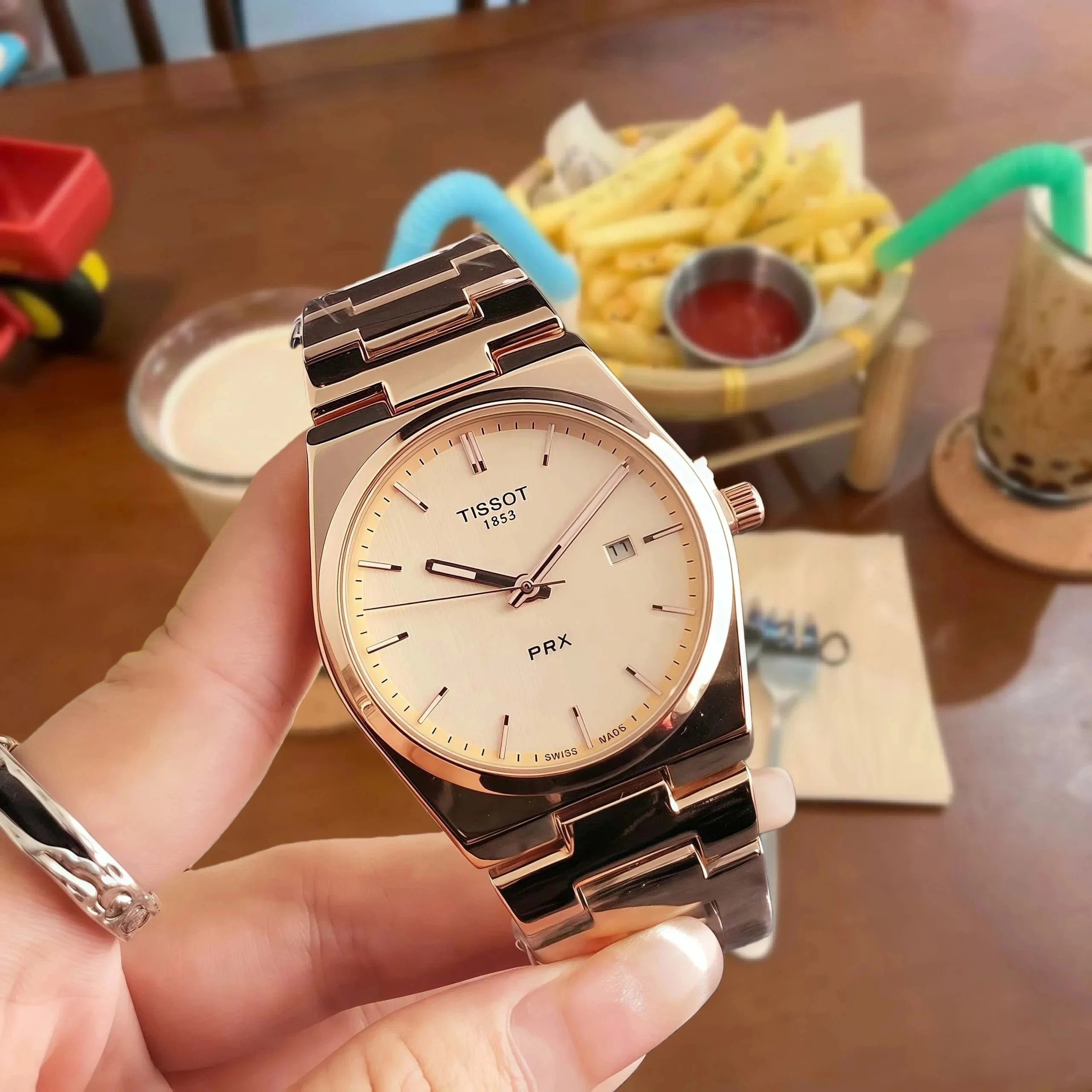 Tissot Watches Analog wristwatch with metal bracelet — 12