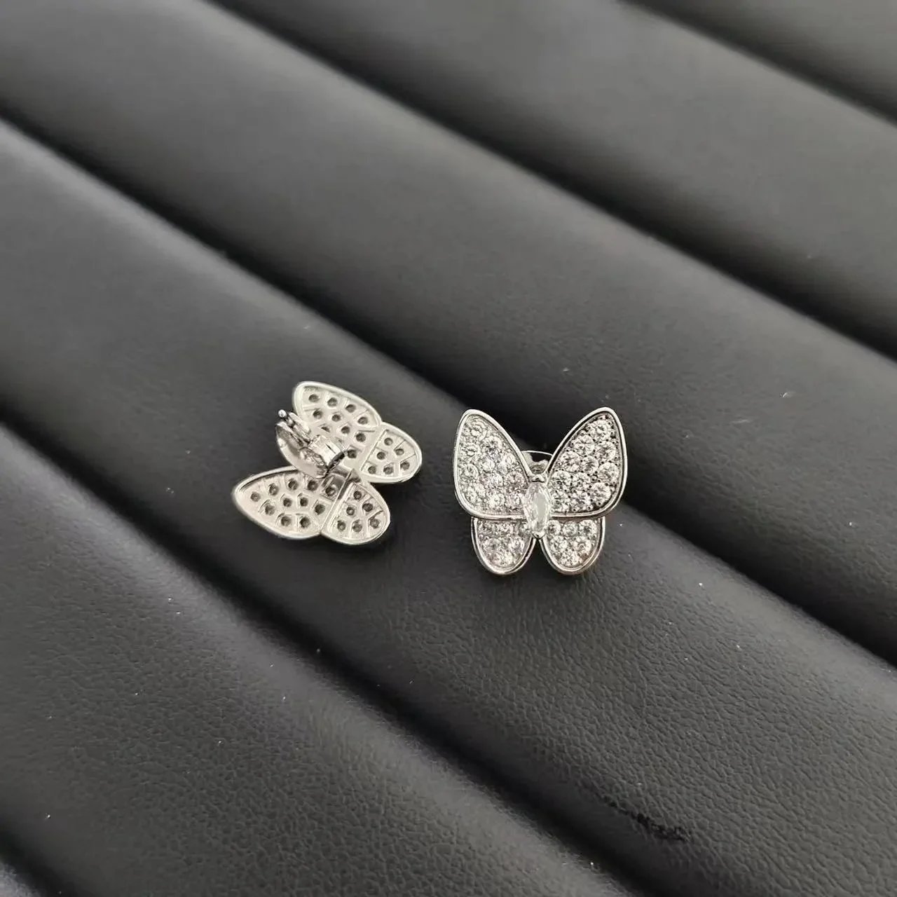 Unbranded Jewelry Floral Butterfly and Leaf Charm Necklace — Butterfly (silver) stud earrings