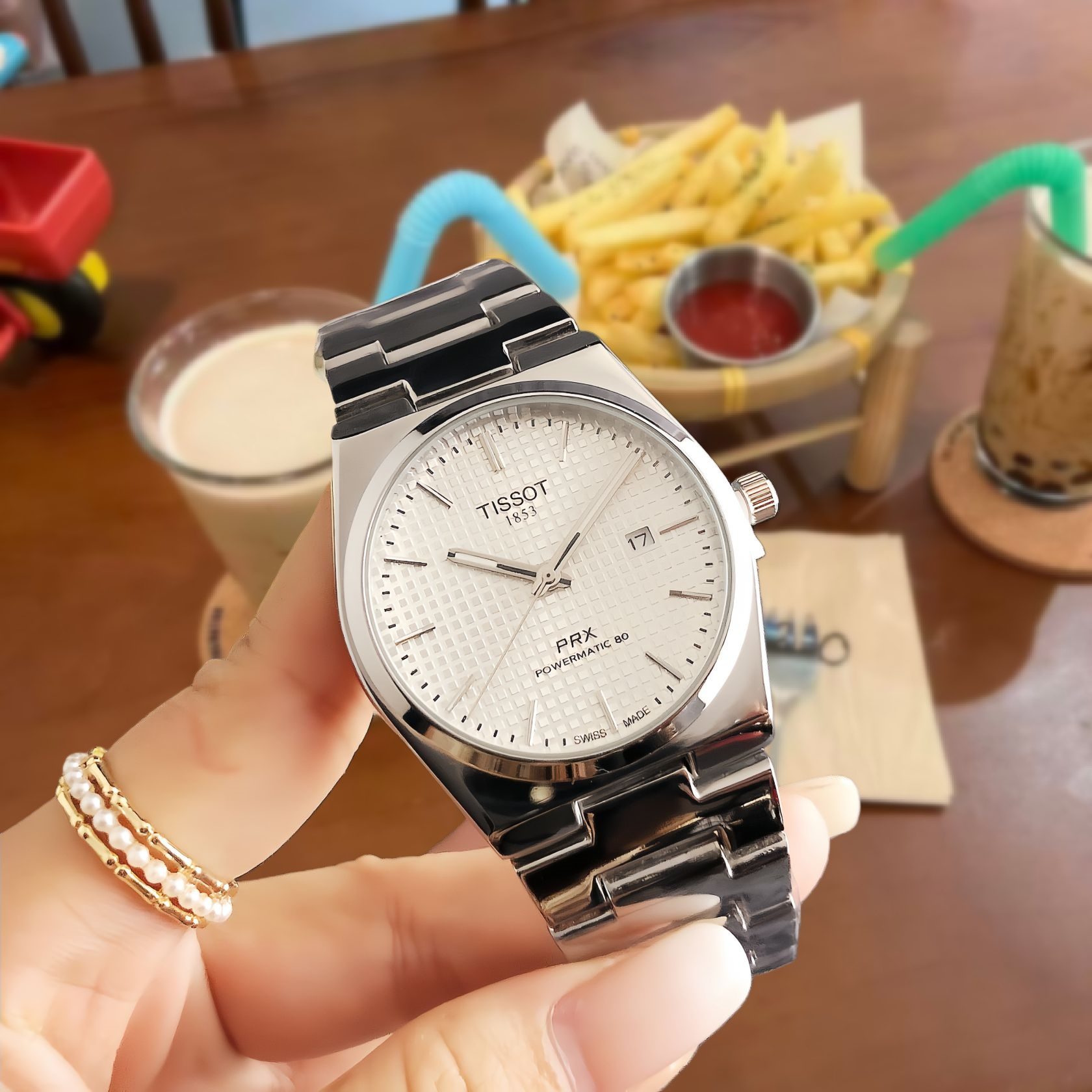 Tissot Watches Analog wristwatch with metal bracelet — 24