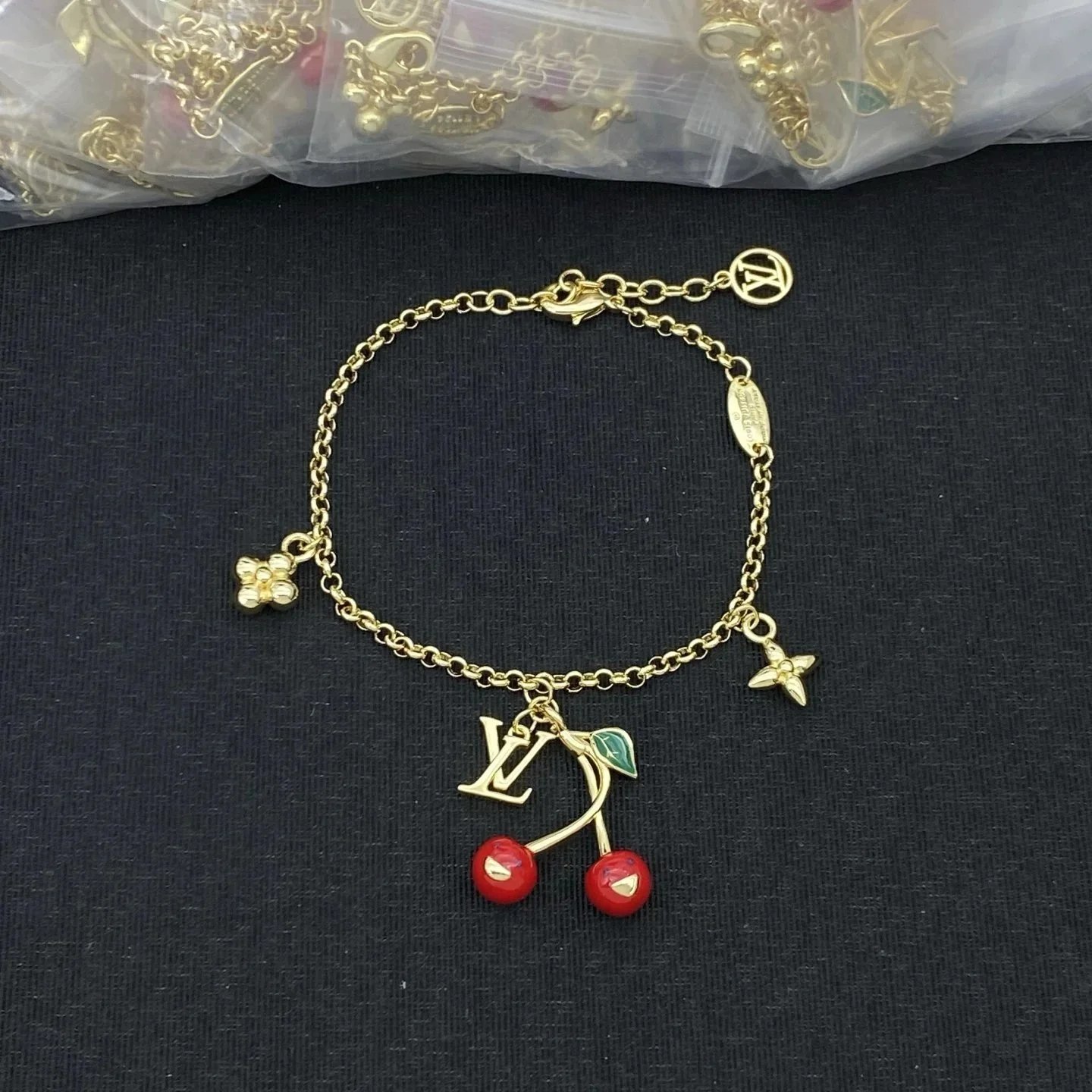 Unbranded Jewelry Floral Butterfly and Leaf Charm Necklace — Cherry (L) Bracelet