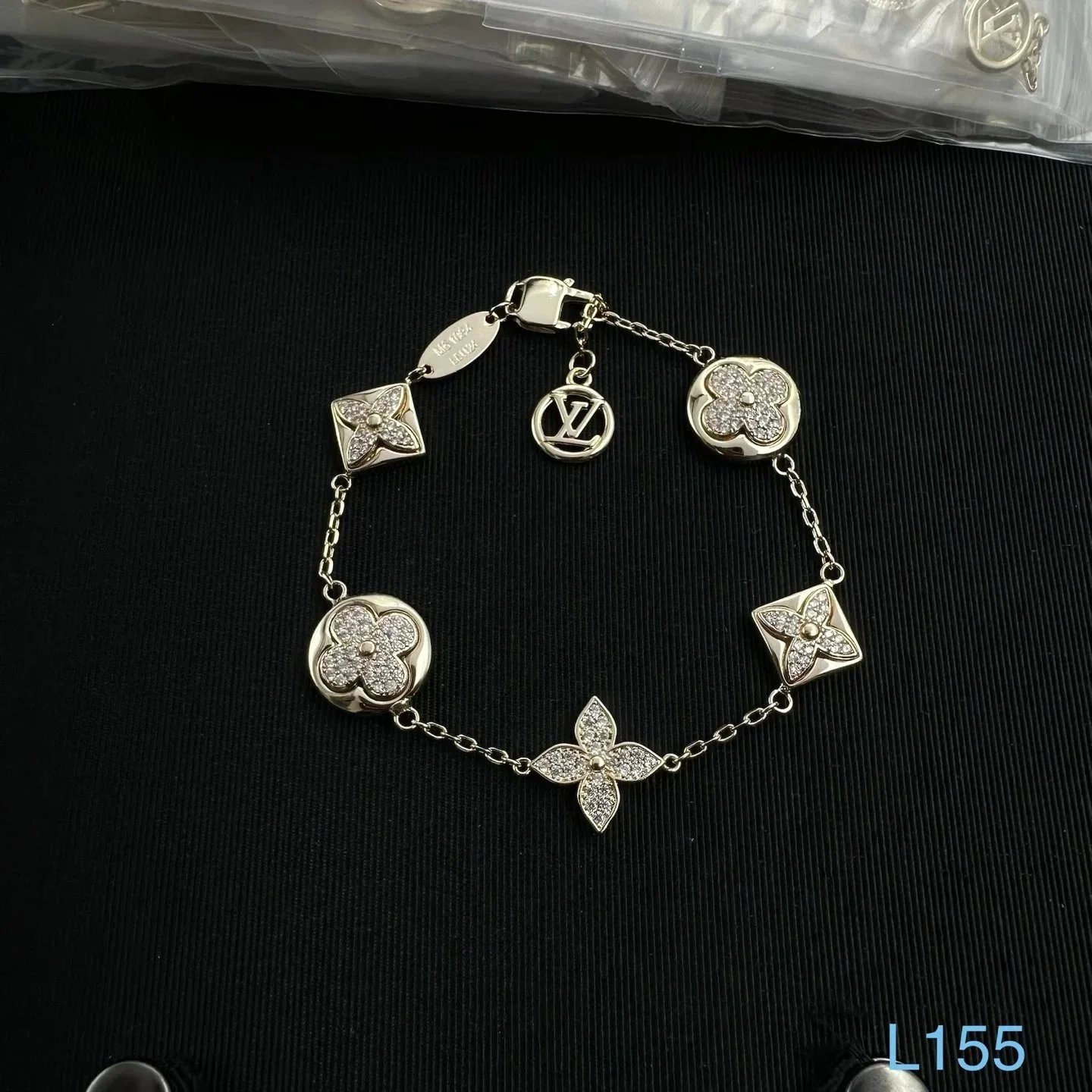 Unbranded Jewelry Floral Butterfly and Leaf Charm Necklace — Multi-flower gold (L) bracelet