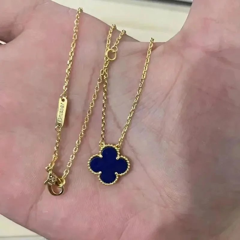 Unbranded Jewelry Floral Butterfly and Leaf Charm Necklace — Golden-colored [Lapis Lazuli] necklace