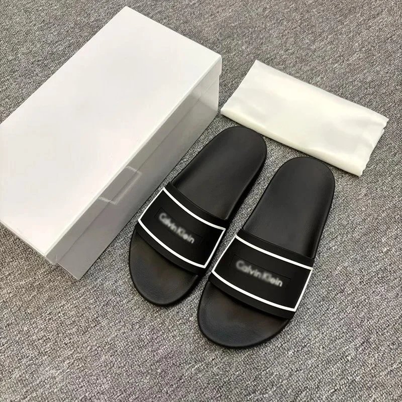 Calvin Klein Slippers Geometric cutout slide — CK-White Letters Black