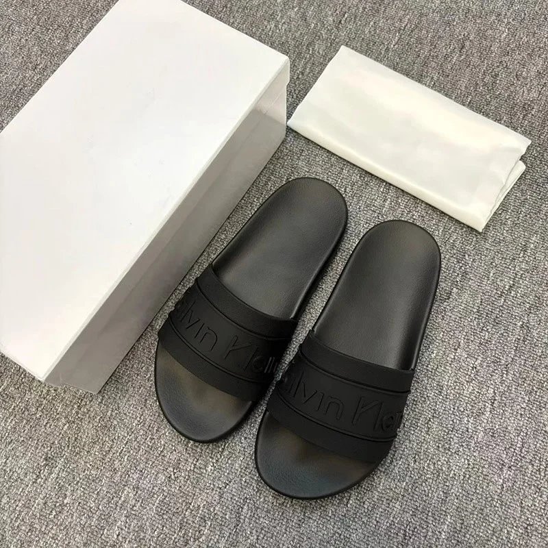 Calvin Klein Slippers Geometric cutout slide — CK-Black letters
