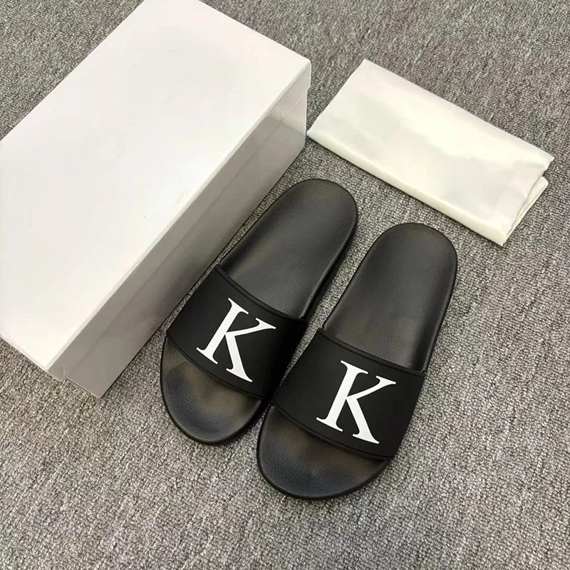 Calvin Klein Slippers Geometric cutout slide — CK-c letter