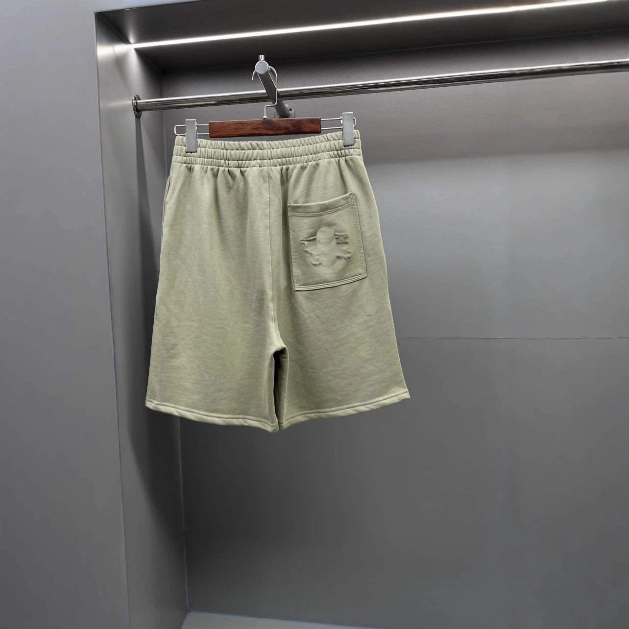 Classic ceiling style logo, back pocket decal, BB shorts, cropped shorts