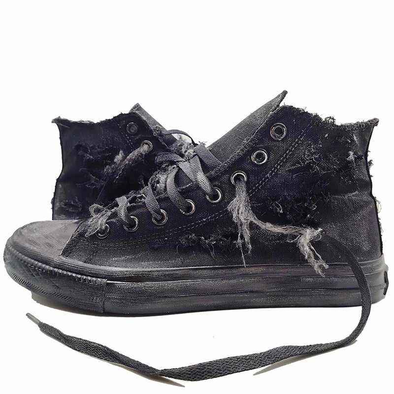 High-top canvas sneakers with holes
