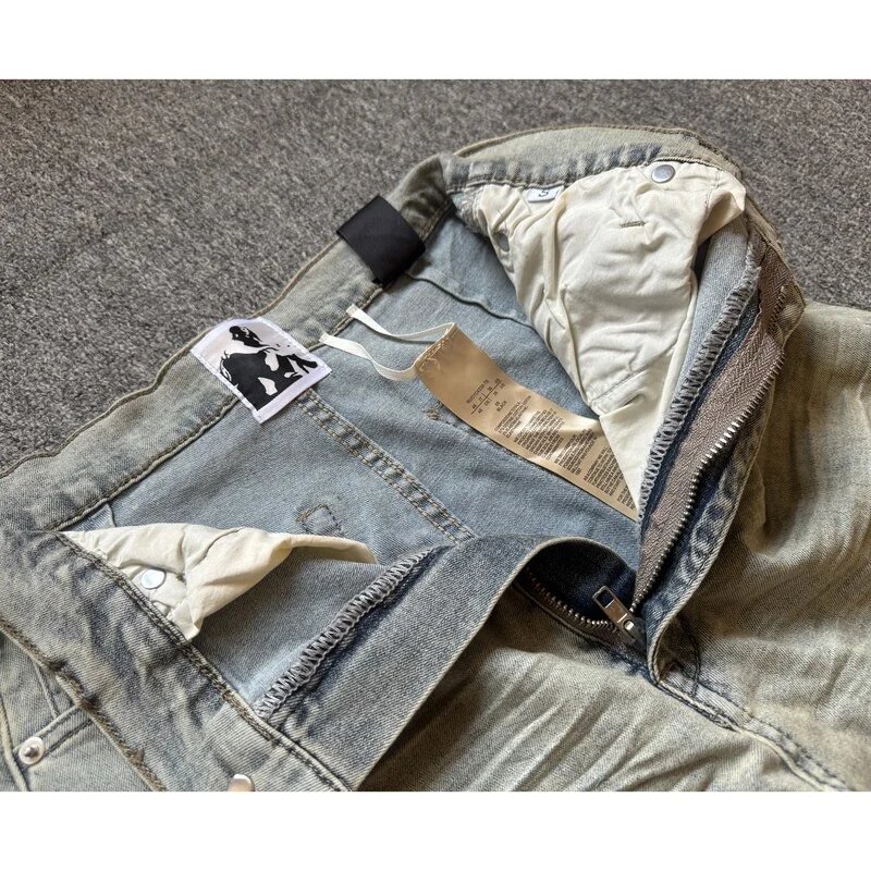 Design Flared High-Rise Distressed Jeans Light Wash - 12