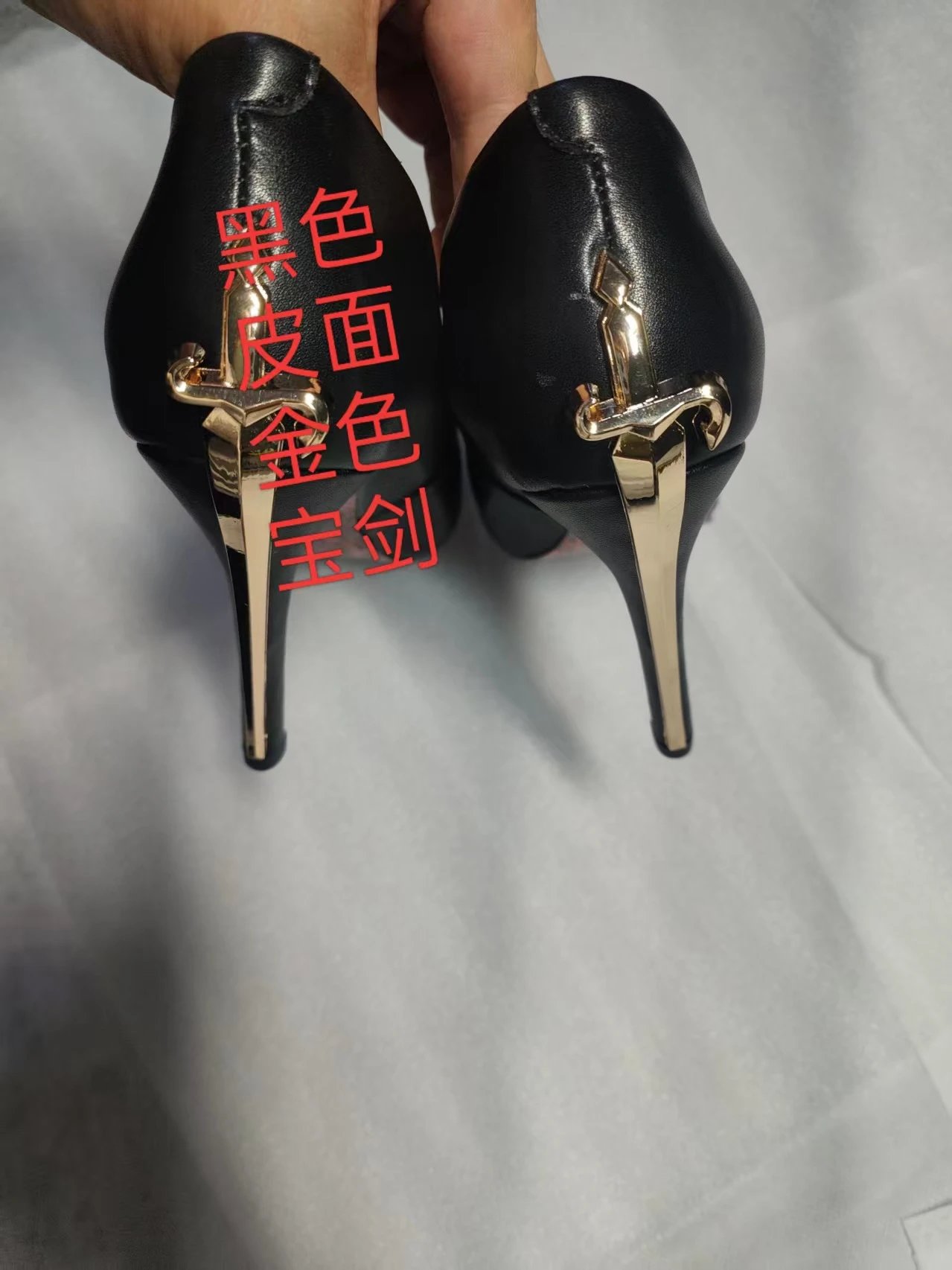 Black leather gold buckle