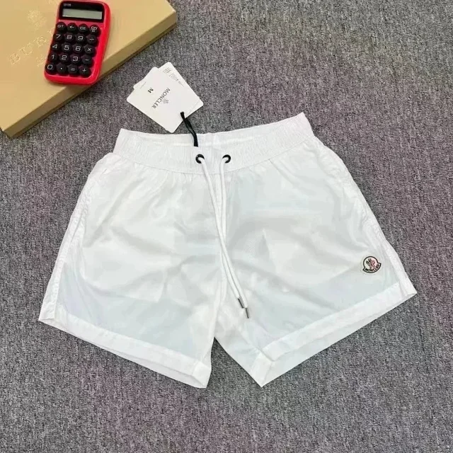 Moncler Swimwear Logo-patch drawstring swim shorts product detail image 14