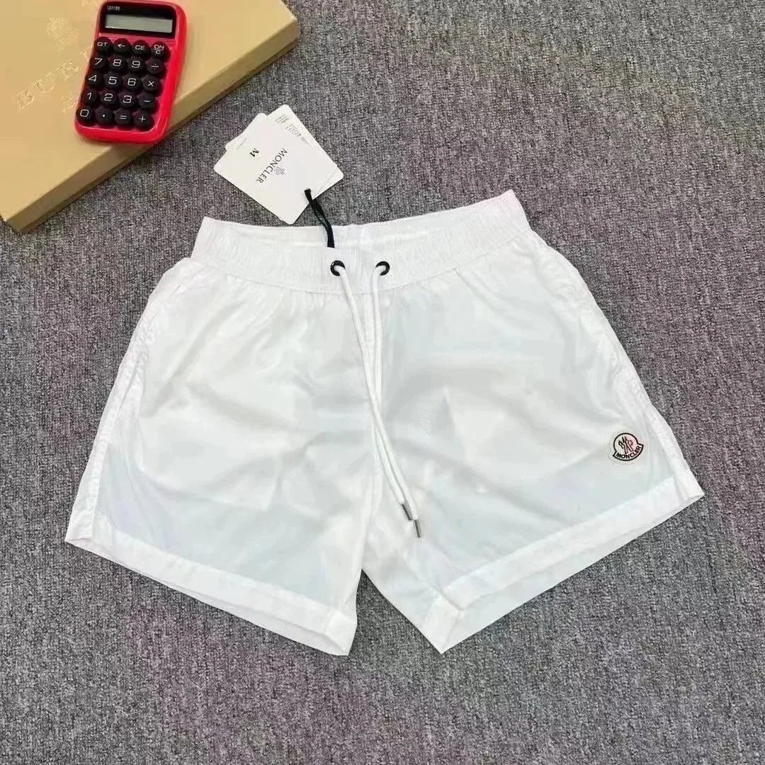 Moncler Swimwear Logo-patch drawstring swim shorts — 1