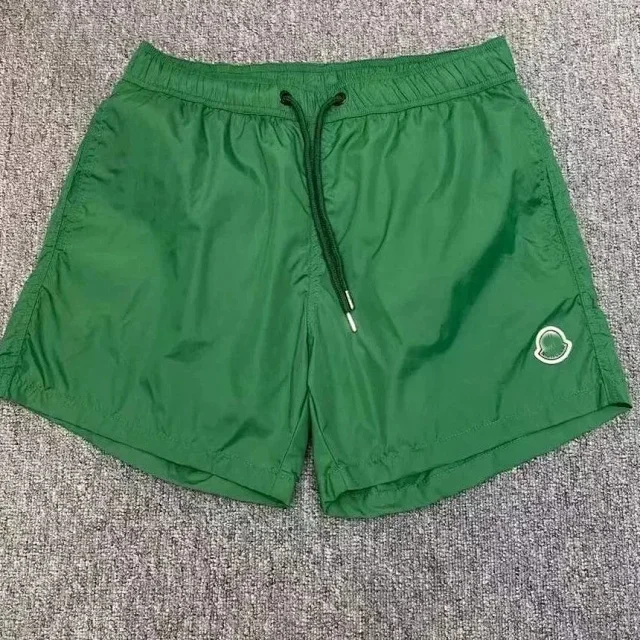 Moncler Swimwear Logo-patch drawstring swim shorts product detail image 9
