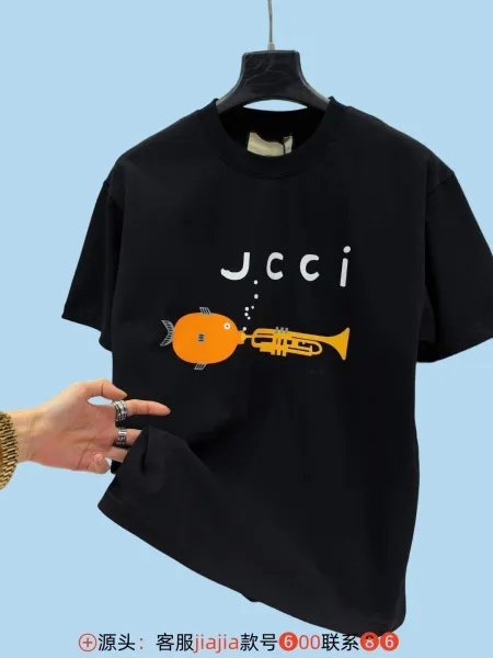 Design JCCI Fish Trumpet Graphic Black T-Shirt T-Shirts - 1