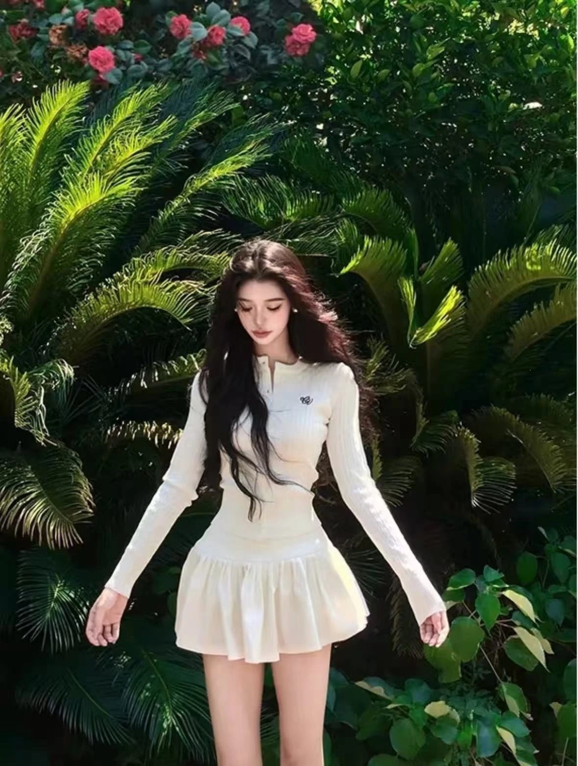 Design Ribbed Knit Mini Dress with Pleated Skirt in Beige