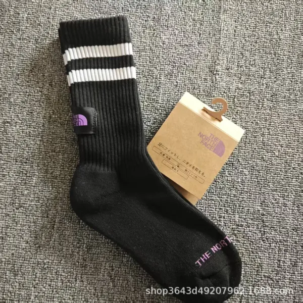The North Face Ribbed Stripe Socks Black with White Stripes and Purple Logo - 1