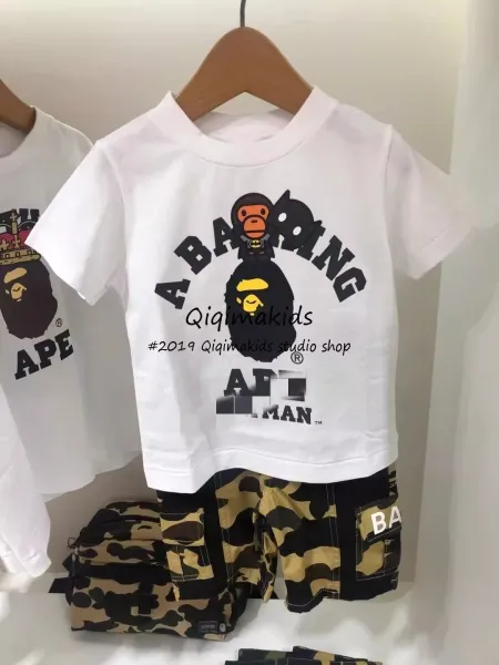 A Bathing Ape x Batman Collaboration Graphic T-Shirt and Camo Cargo Shorts Set - 1