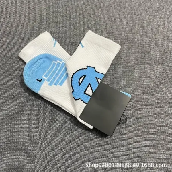 Design North Carolina Tar Heels Logo Socks White and Light Blue Socks - 1