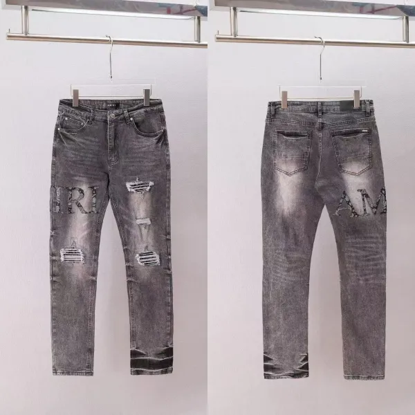 Amiri Distressed Logo Print Slim Fit Jeans Gray - 1