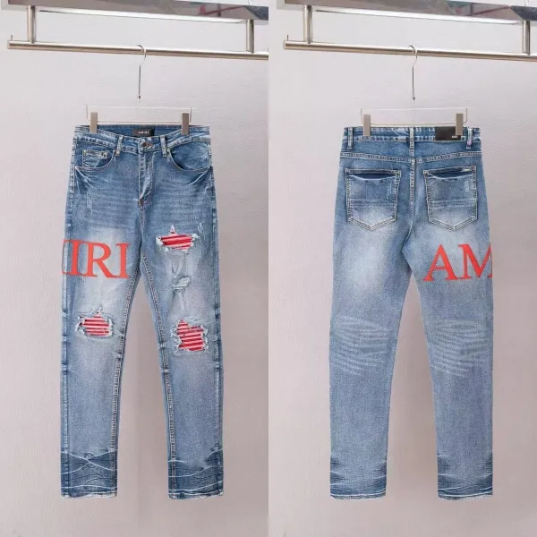 Amiri Distressed Logo Jeans Blue - 1